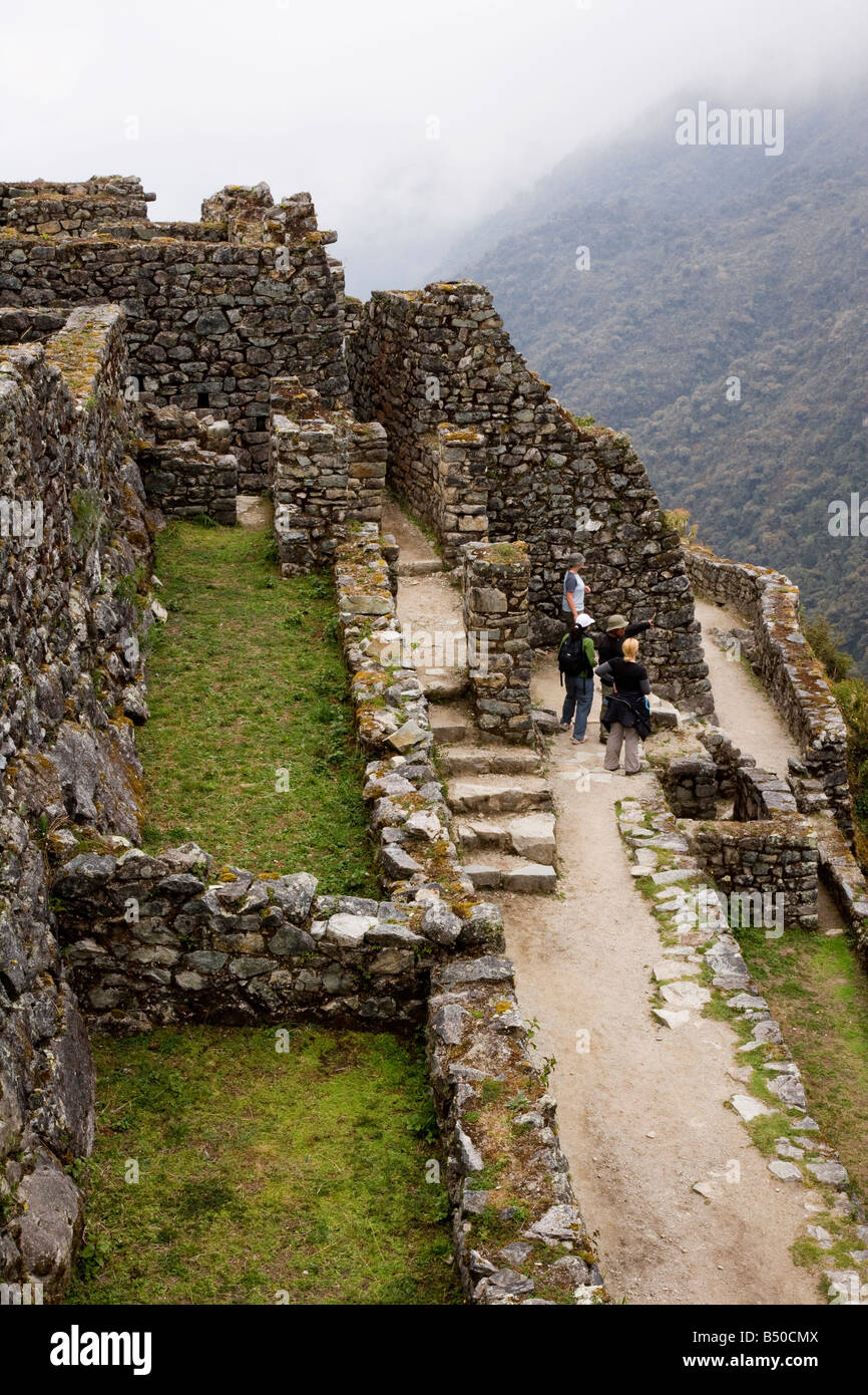 Ancient Incan site or ruin of Sayaqmarka, on the third day three of the four day Inca Trail through the Andes of Peru. Stock Photo