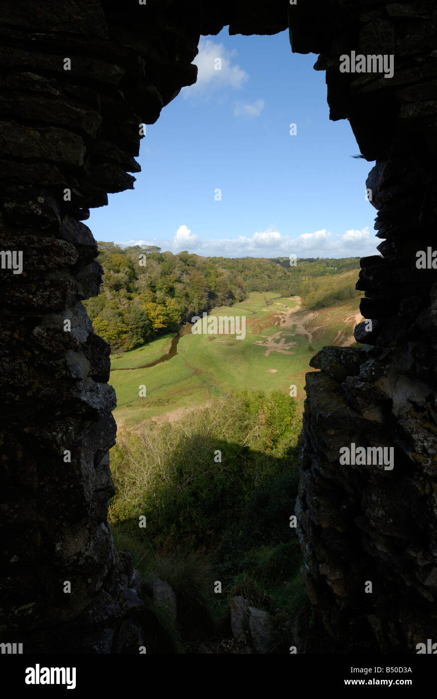View through wall of Pennard Castle on the Gower Peninsula Stock Photo