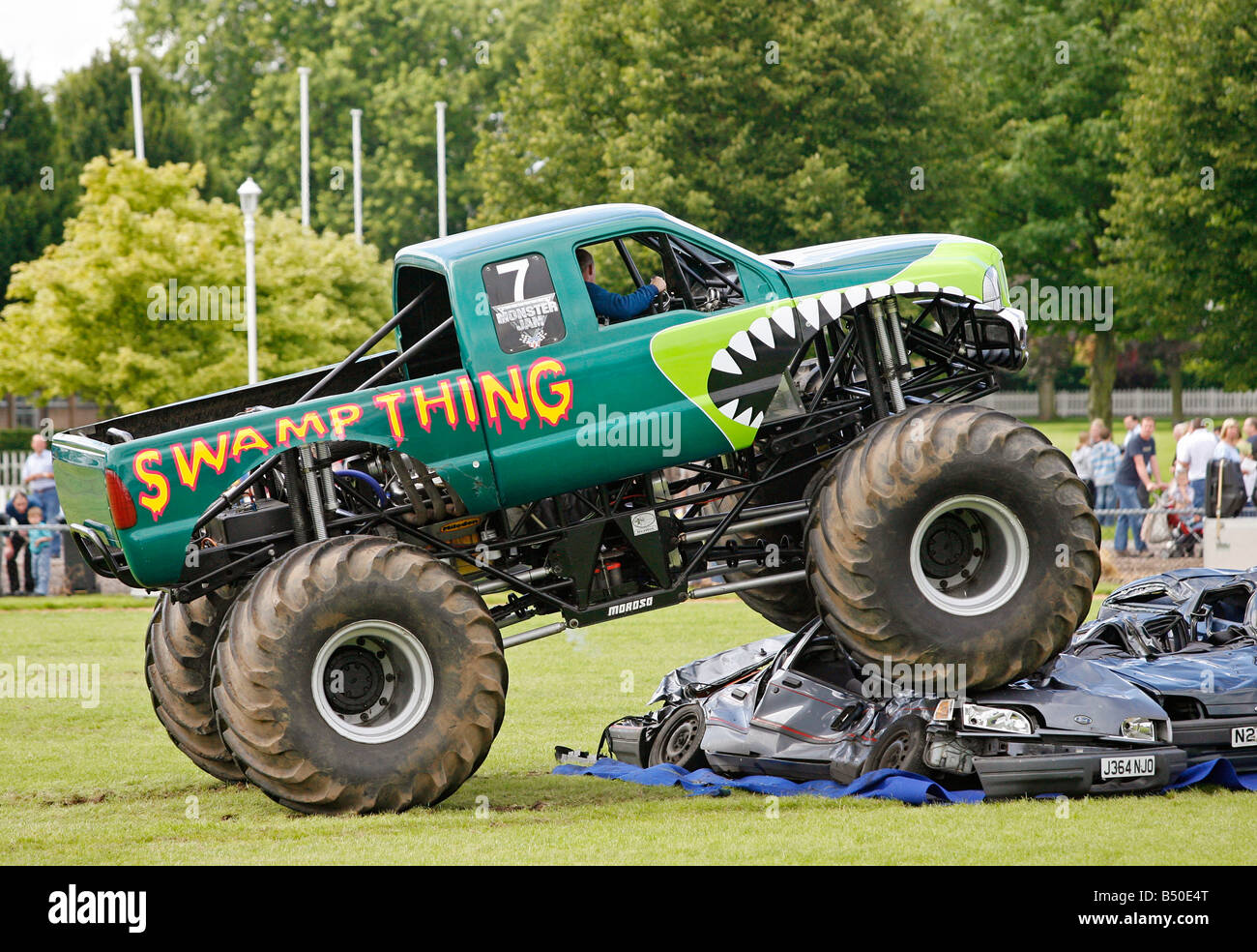 Monster truck crushing cars Stock Photo - Alamy