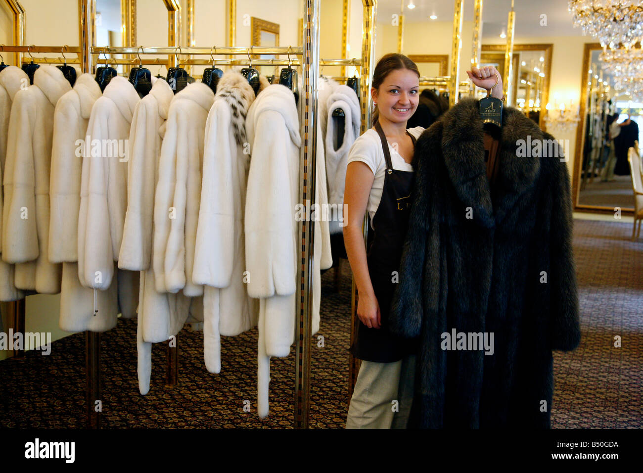 Aug 2008 - Woman holding a sable fur coat which cost 300 000 Euros at the exclusive Lena boutique St Petersburg Russia Stock Photo