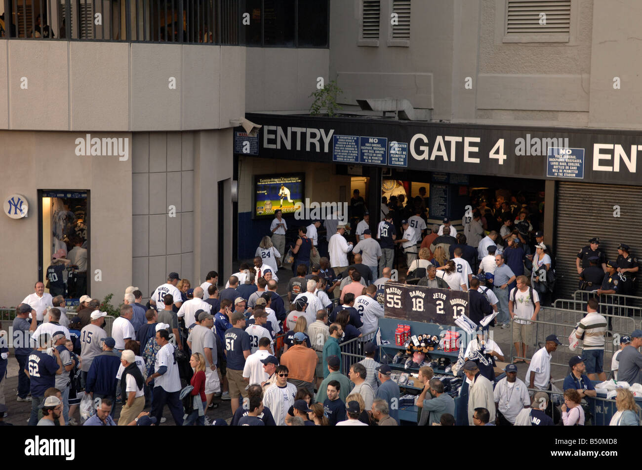 Baseball fans arrive at Yankee Stadium in the New York borough of The Bronx Stock Photo