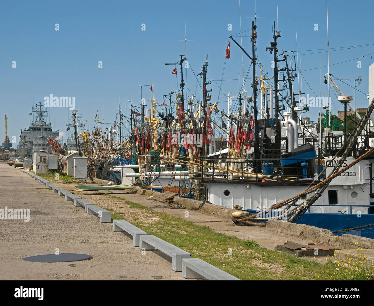 old fishingboats at wharf and trading port at Baltic Sea in town Liepaja Latvia Baltic states Stock Photo