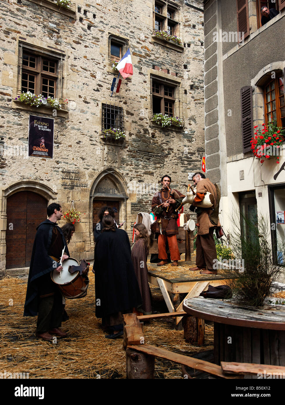 Muscians in Medieval costumes at Estaing Stock Photo