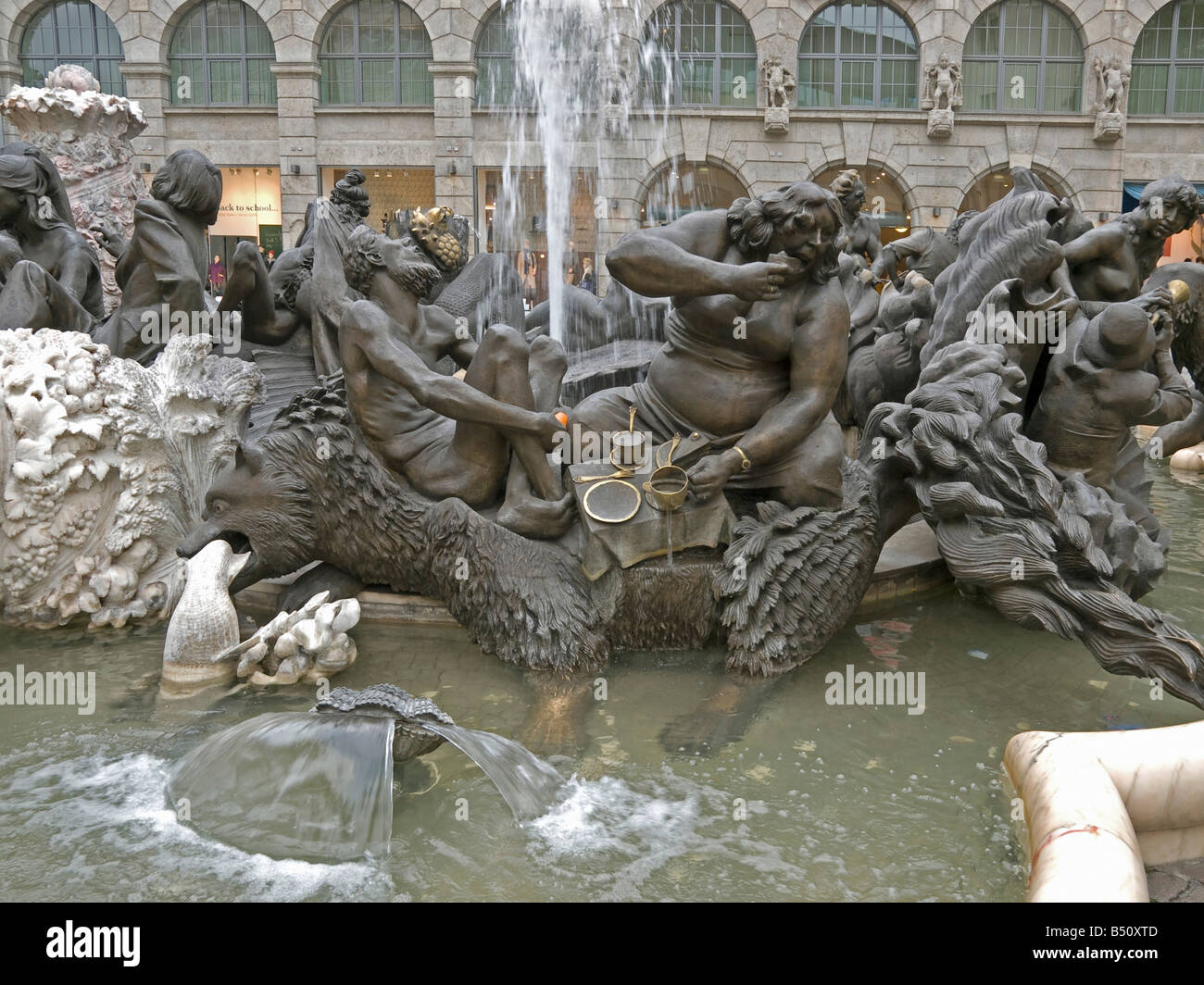 marriage fountain with different figures of people and animals and different situations love domestic quarell death Nürnberg Stock Photo