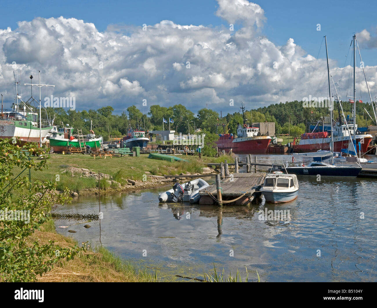 wharf and old port ships and boats at Baltic Sea in Pavilosta Latvia Baltic states Stock Photo
