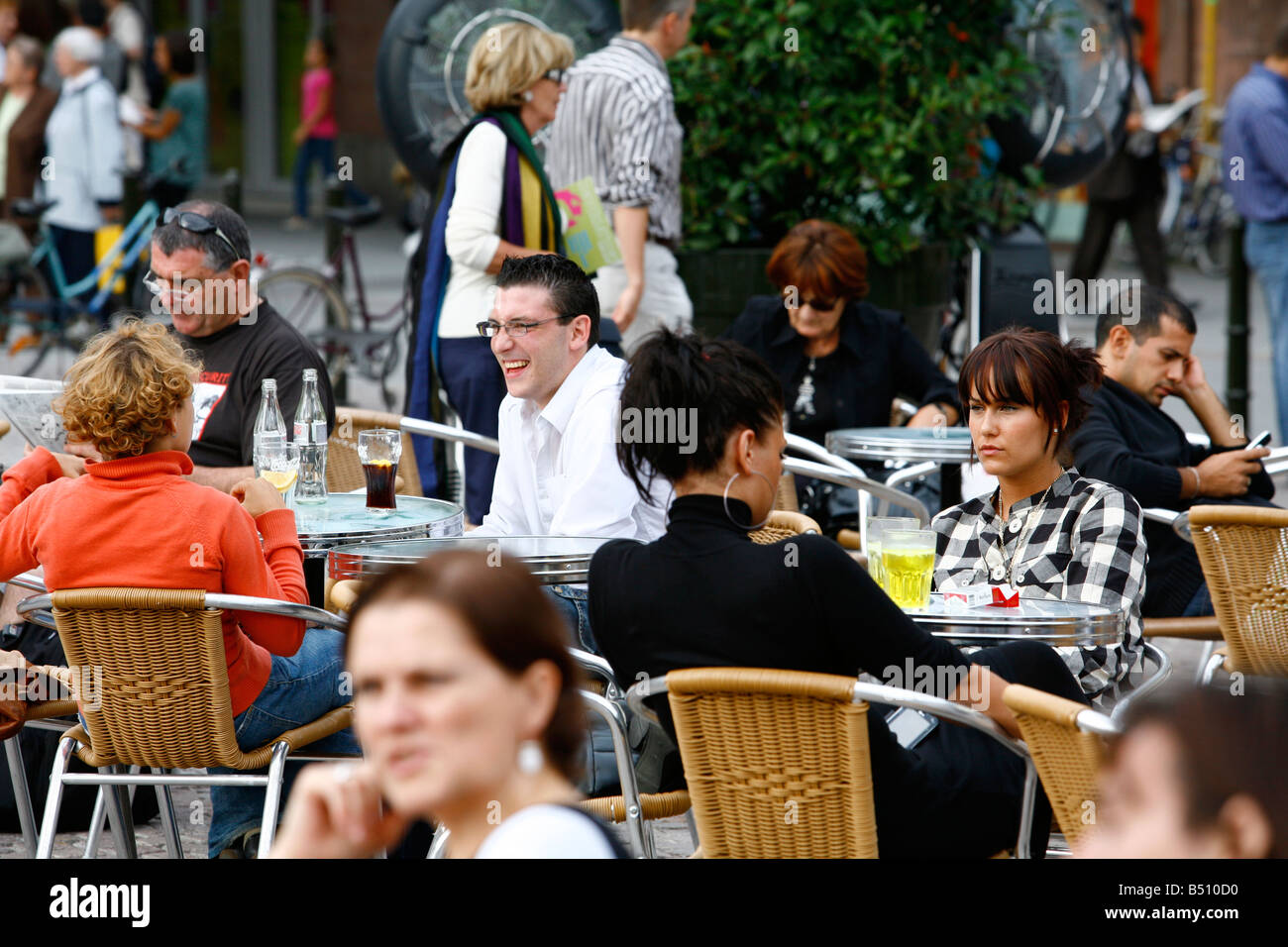 Sep 2008 - People sitting at an outdoors cafe in Place Kleber Strasbourg Alsace France Stock Photo
