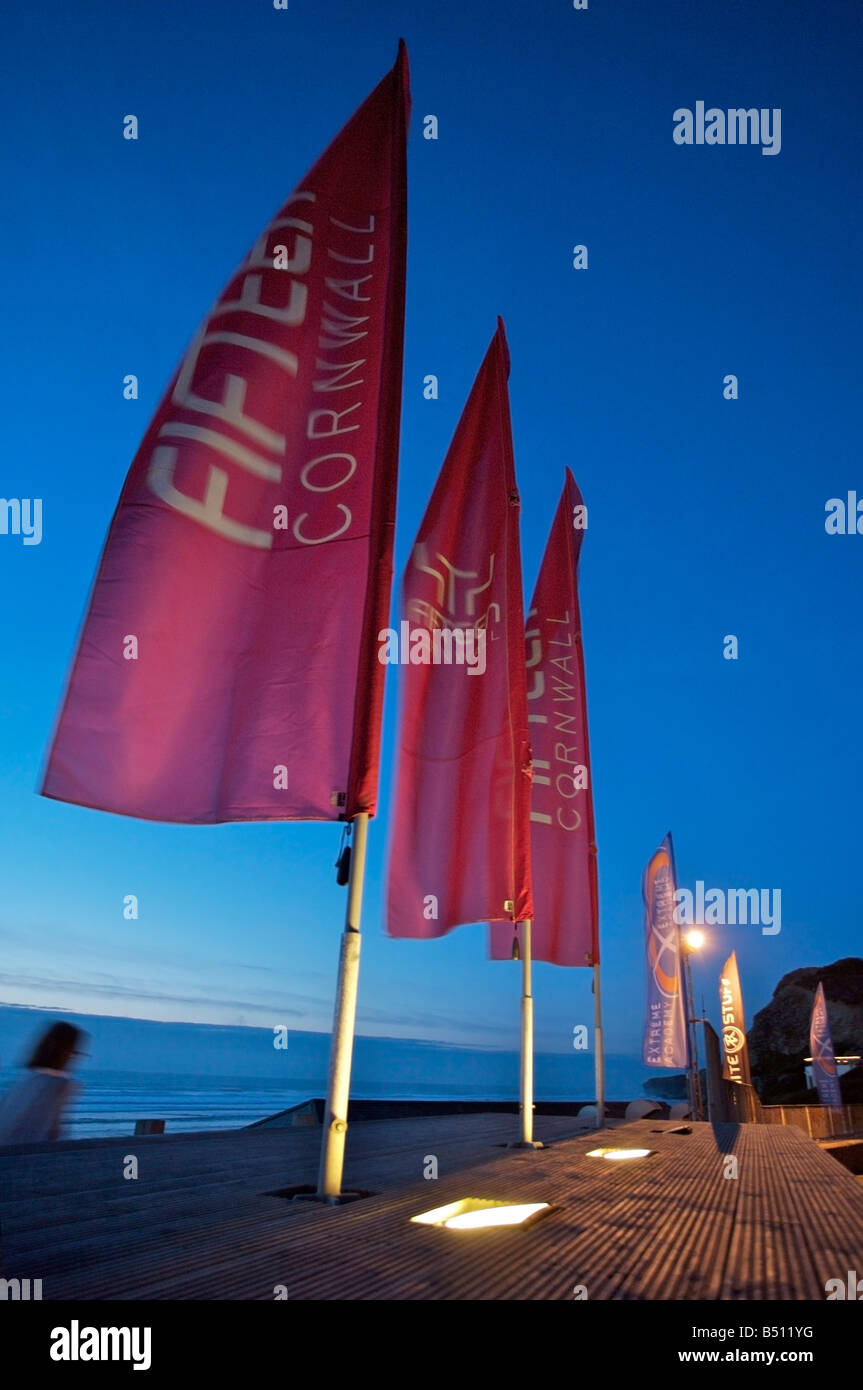 Flags flying at Fifteen Cornwall, Watergate bay, the inspirational restaurant set up by Jamie Oliver Stock Photo
