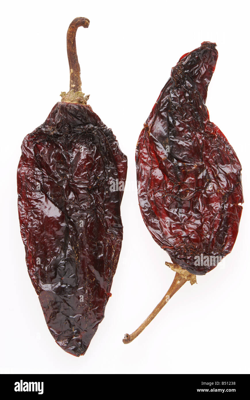 two ancho chiles (dried poblano chiles, dried red peppers used in