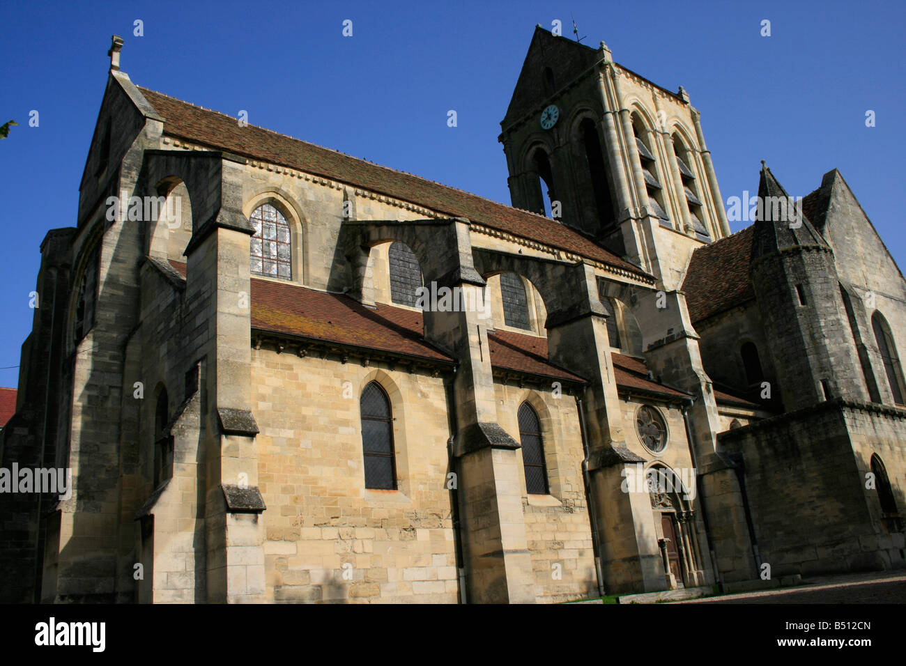 The medieval church of Notre Dame de l'Assomption in Auvers sur Oise Stock Photo