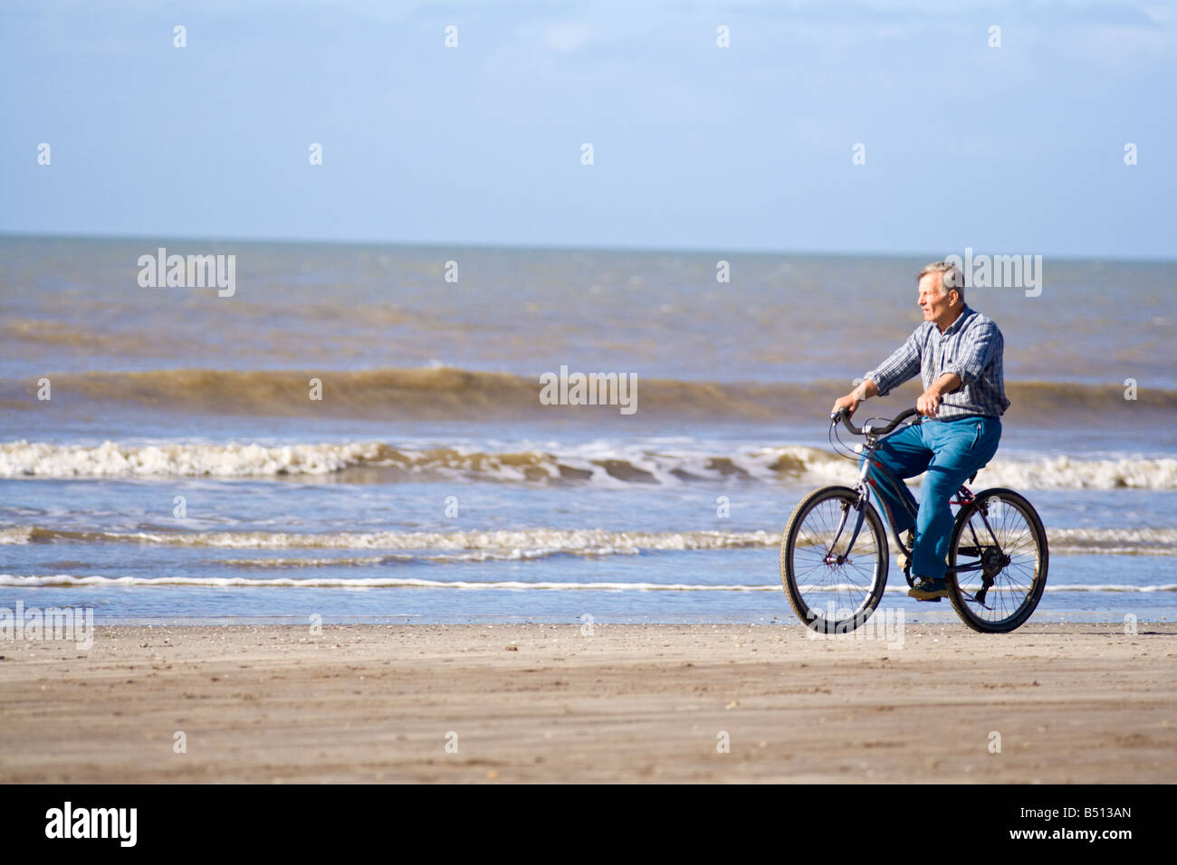 riding a bike on the beach