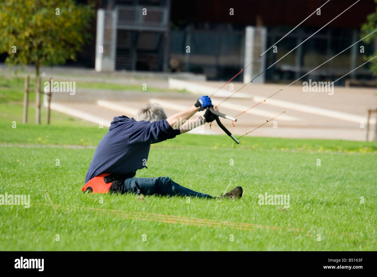 man flying a power kite Stock Photo Alamy