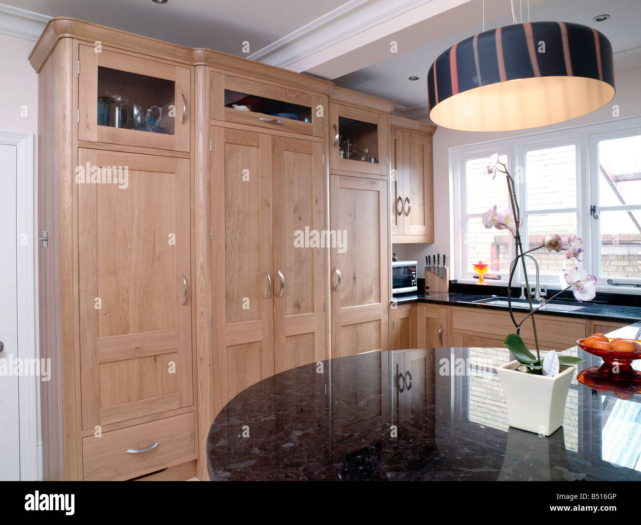John Ladbury kitchen in light wood and off white paint Stock Photo
