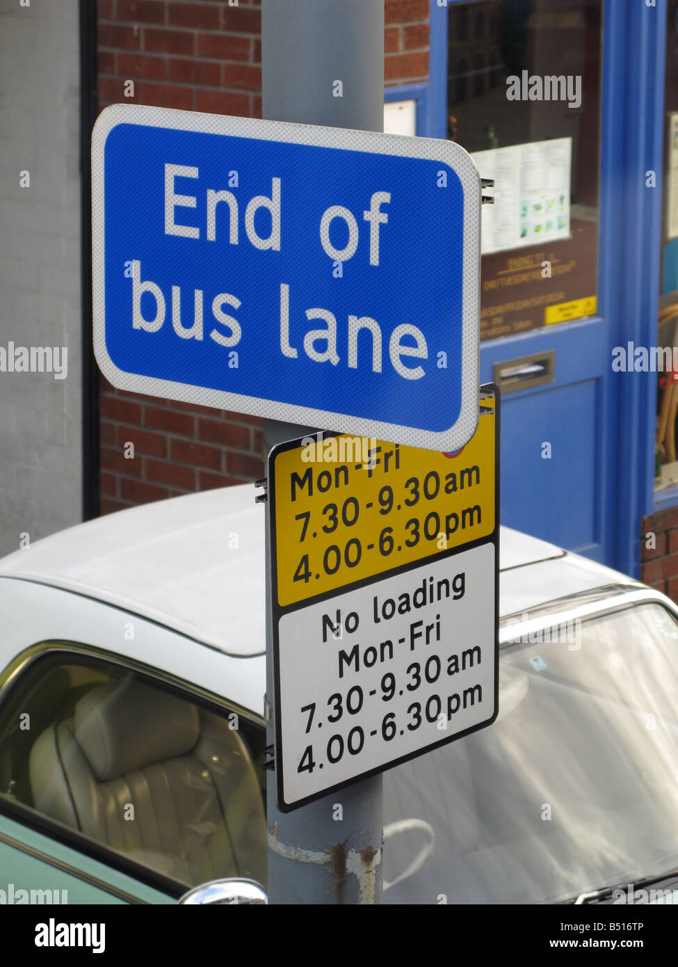End of bus lane and no loading signs Stock Photo Alamy