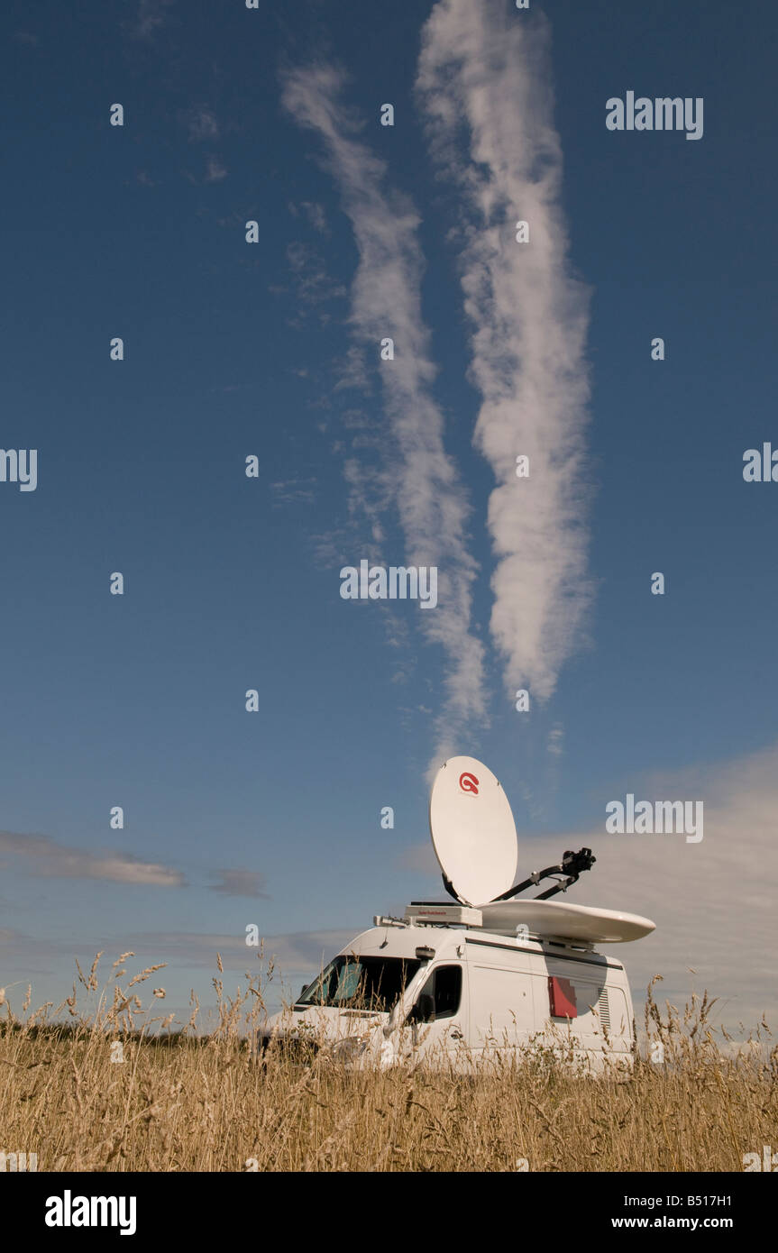 outside broadcast satellite vehicle in a remote location Stock Photo