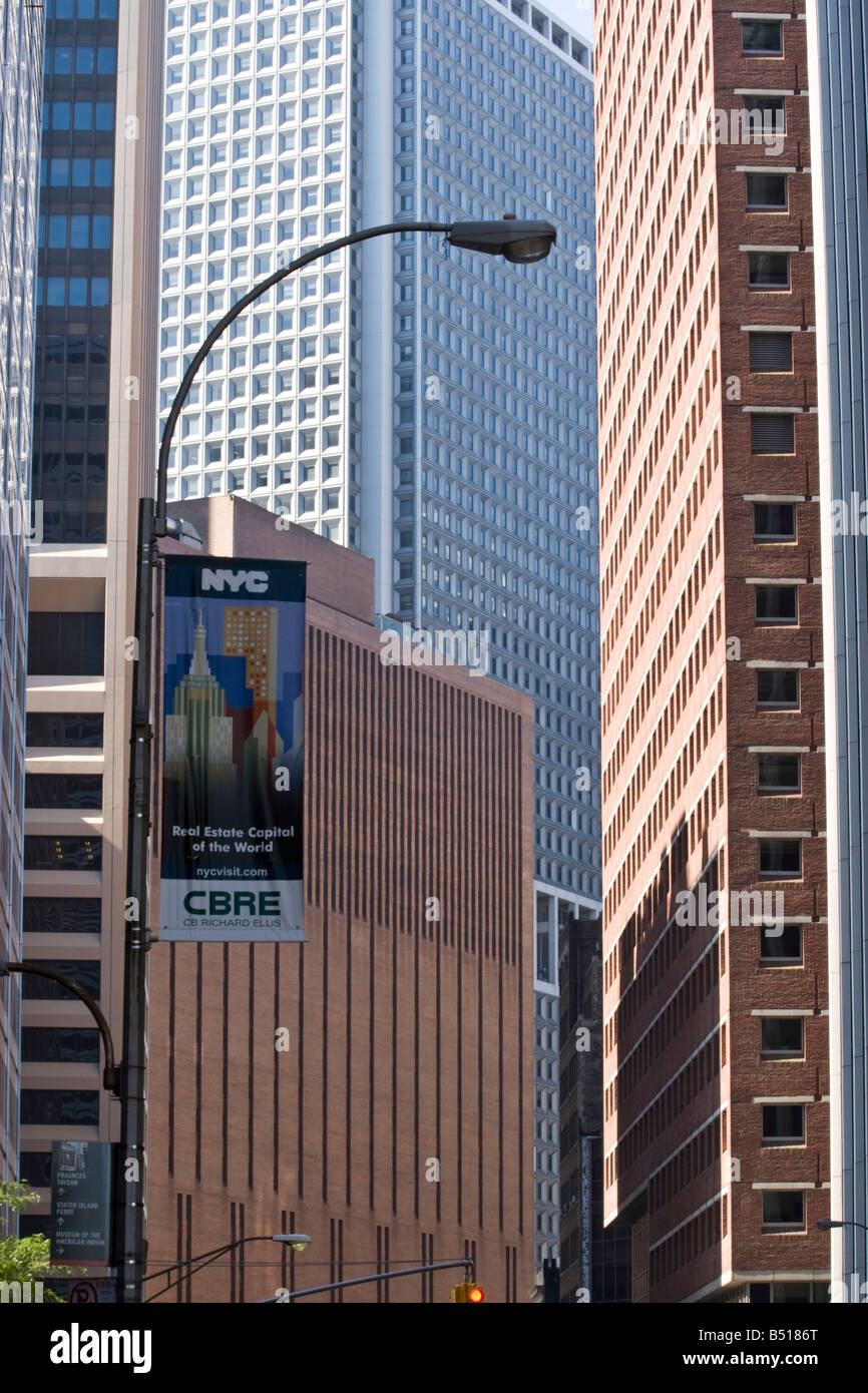 Buildings are seen behind a commercial real estate poster in downtown Manhattan, New York. Stock Photo