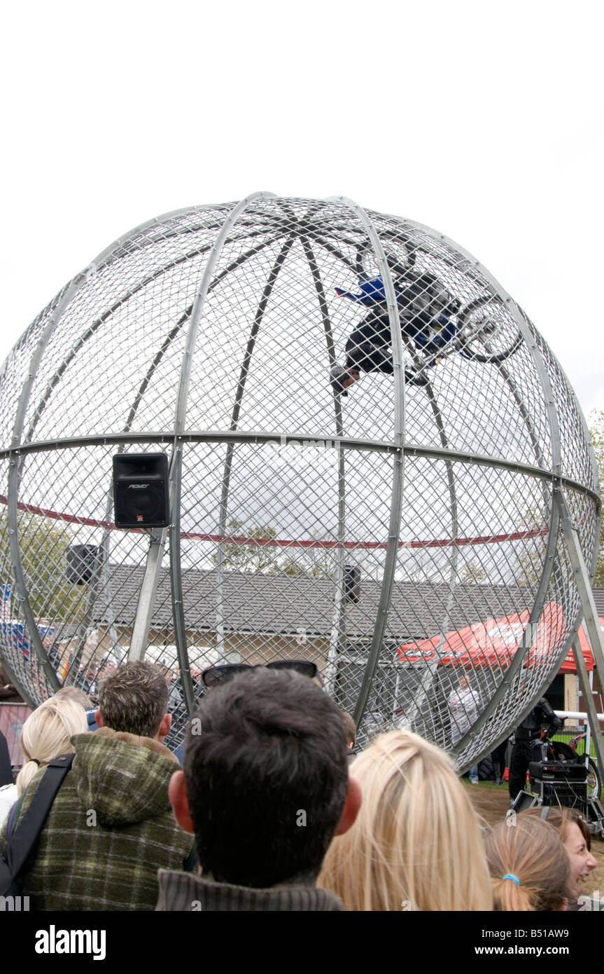 motorcycle globe rider riding motor cycle bike motorbike circus act show  wall of death stunt stunts upside down Stock Photo - Alamy