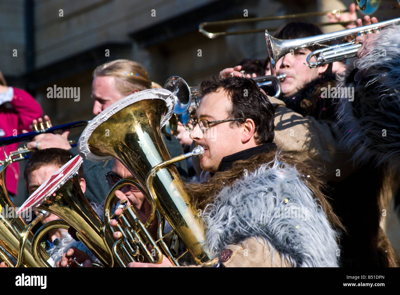 Musicians from a Guggenmusik band Schloesslifaeger play at the Fete des Vendanges Stock Photo