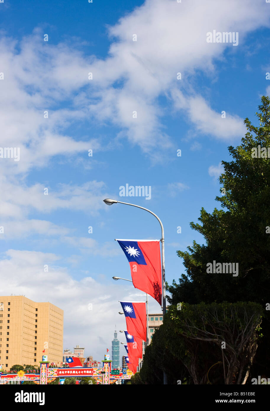 Taiwan national flag with Taipei 101 in the distance, Taipei, Taiwan, Republic of China (ROC). Stock Photo