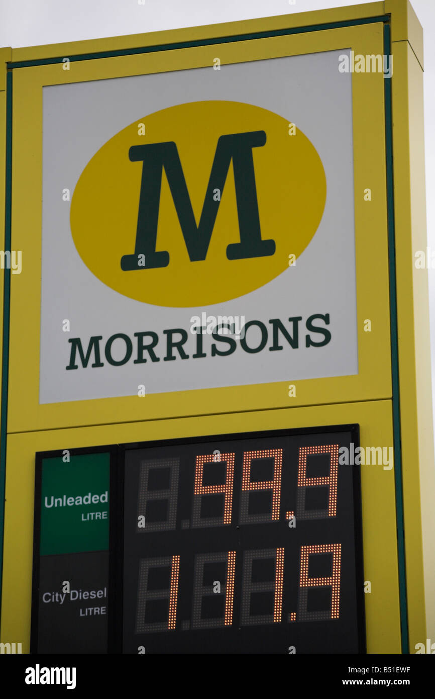 Petrol prices dip below a pound per litre at Morrisons filling station Tiverton Stock Photo