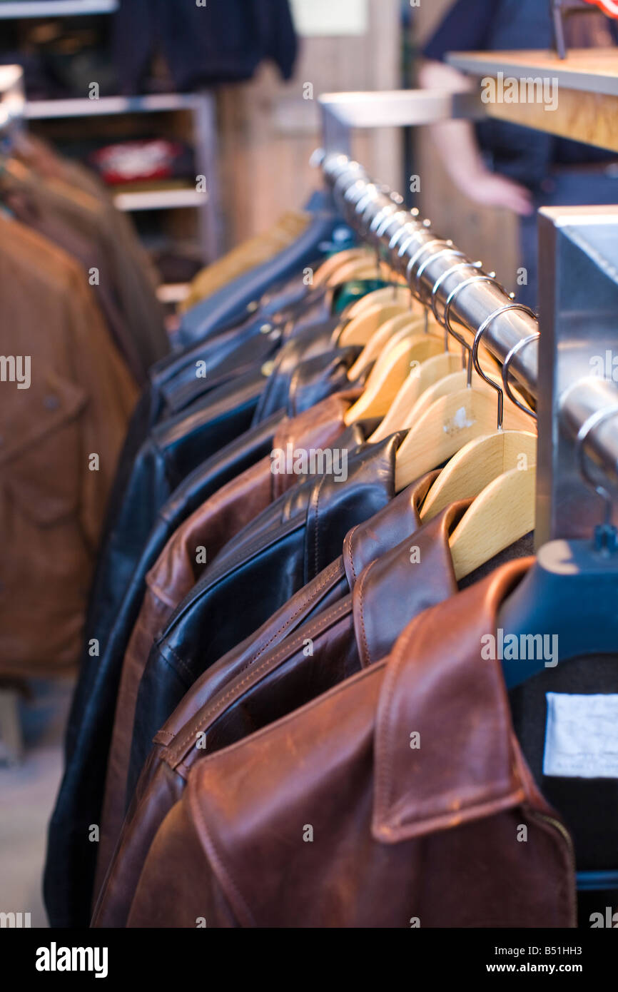 clothes hanger with leather jackets Stock Photo Alamy