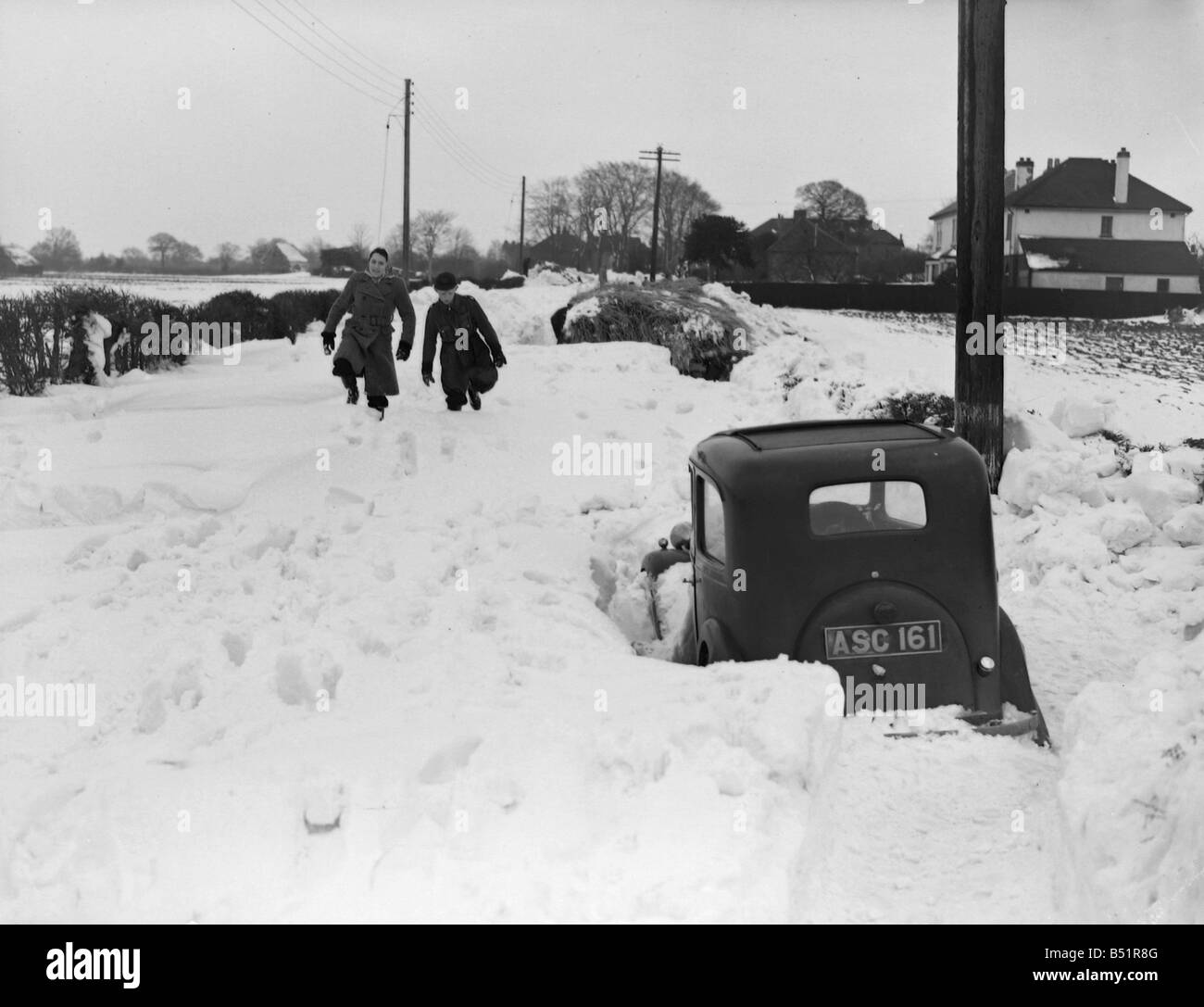 F.W. Reed Staff;Mar. 31st 1952;Main road between Biggin Hill and Westerham, Kent buried under 8