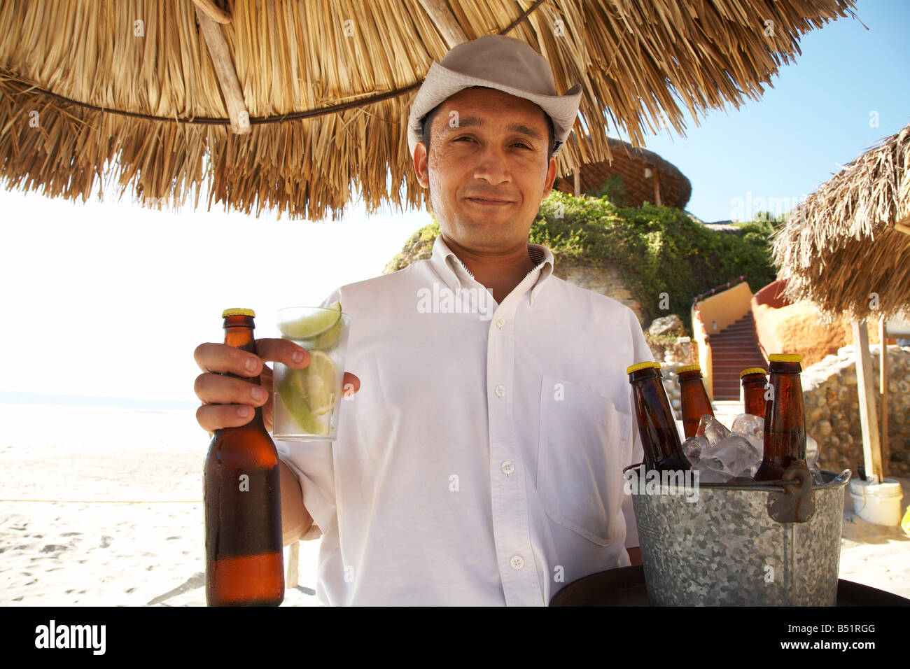 Portrait of Waiter at Beach, Mexico Stock Photo