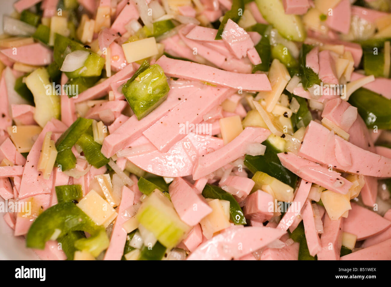 Sausagecheese salad with green peppers Stock Photo Alamy