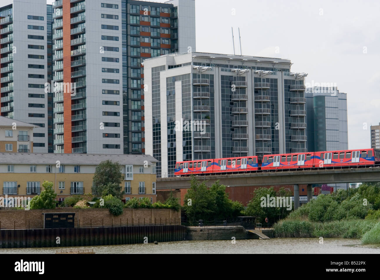Blackwall east London with a DLR - Docklands Light Railway train Stock Photo