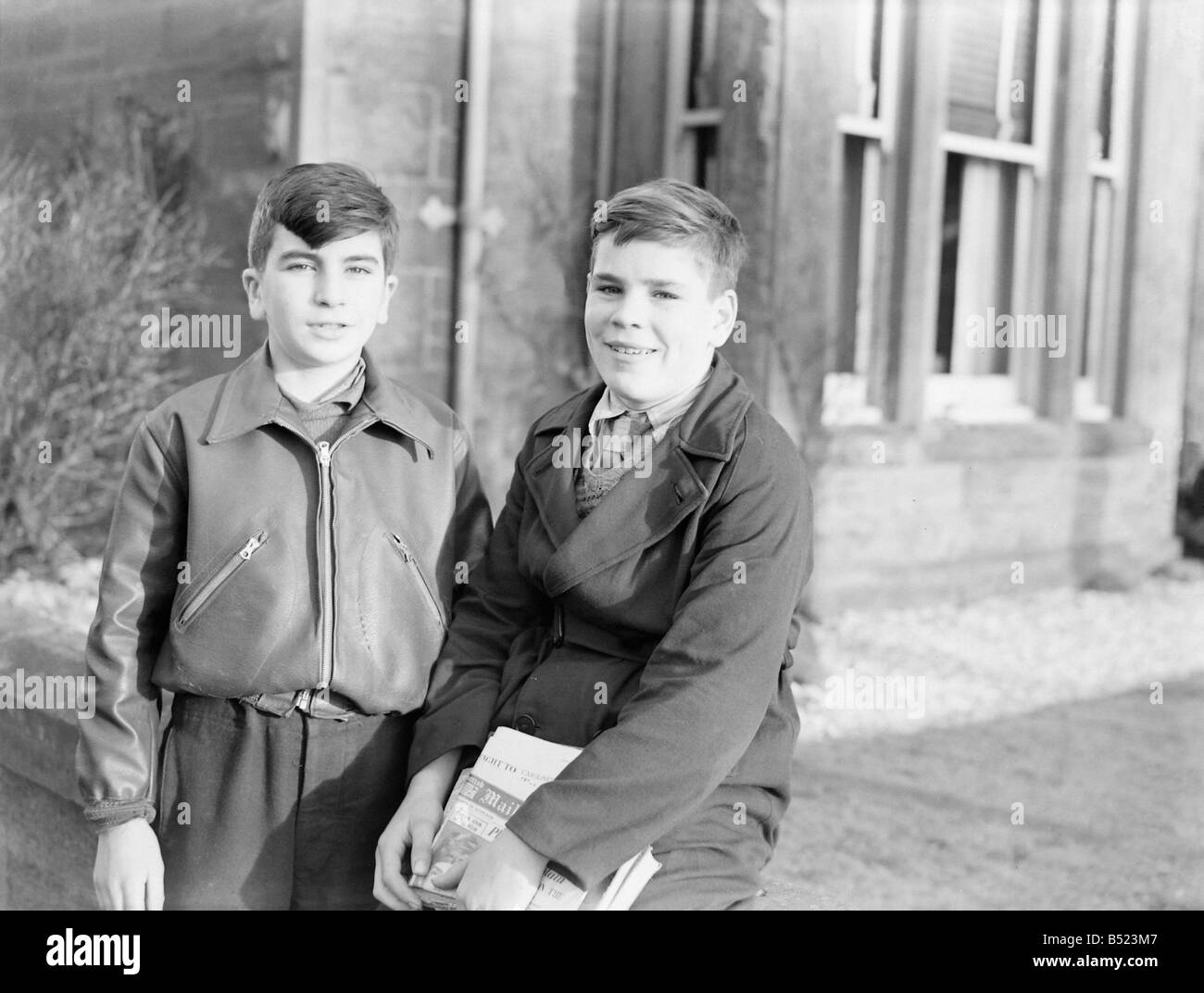 Two teenage boys January 1950 George Anderson and Jimmy Creightonplan trip to France with Johnny Guthrie in the Girl Jean Stock Photo