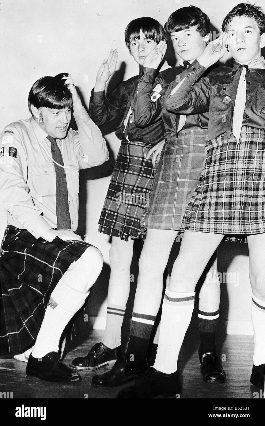 Scoutmaster Peter Anderson of Ullapool scout troop doesn t like the short kilts Stock Photo