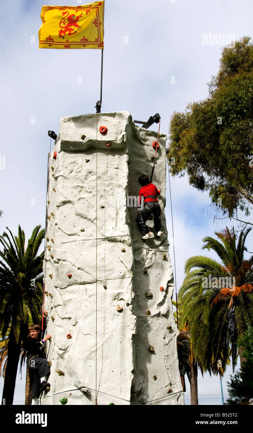 Children climbing rock wall at playground in Justin Herman Plaza on the