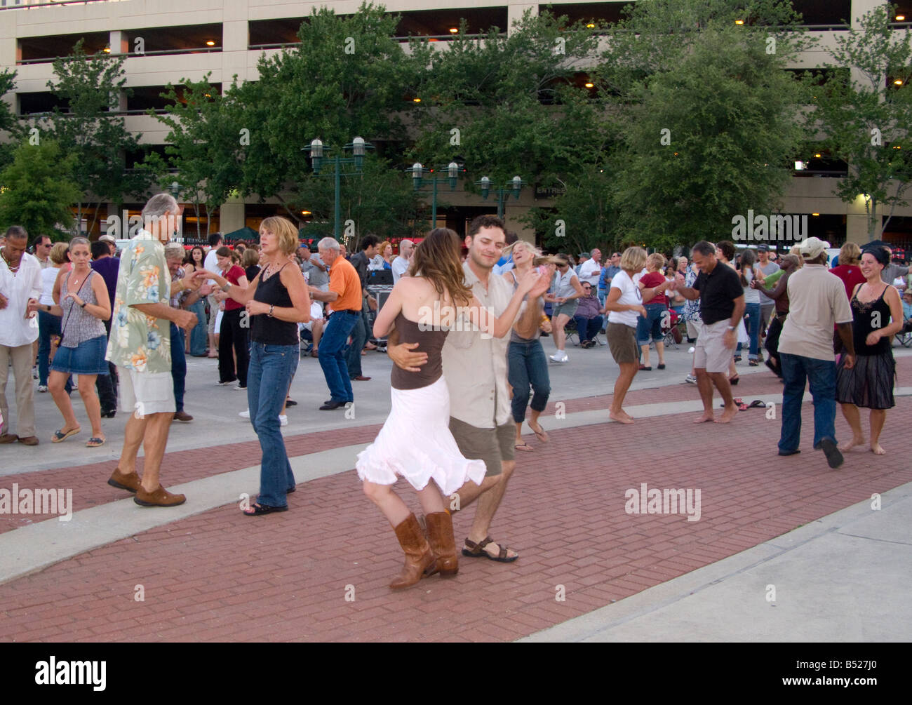 Downtown Alive! where dancers celebrate Thank God It's Friday outdoor concert series in Lafayette, Louisiana Stock Photo