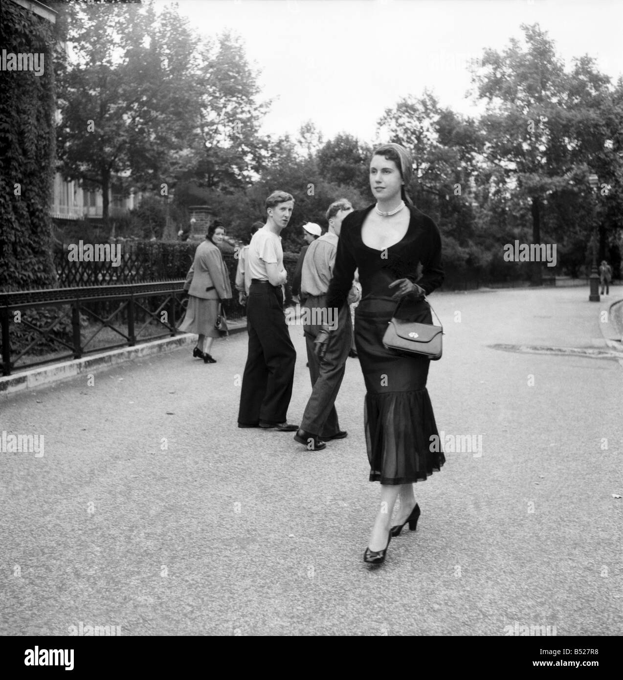 Model Jo Bevan wearing fashions of the day. . July 1952 C3529-001 Stock ...