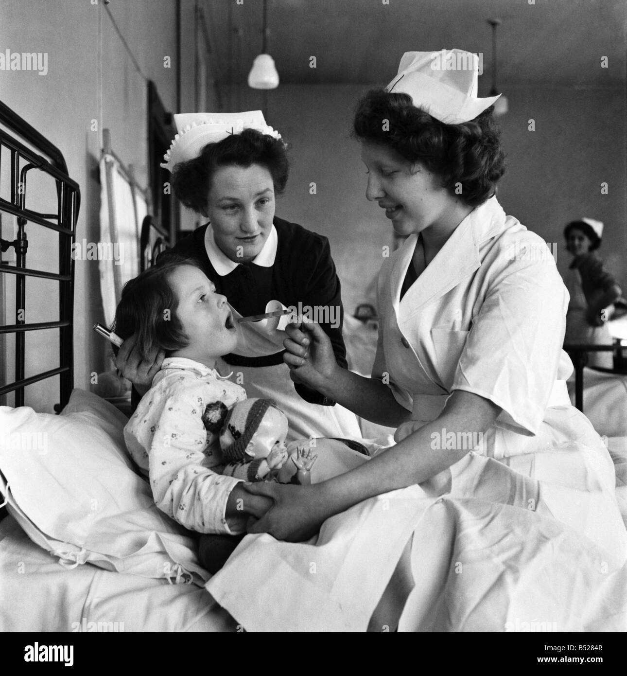 Teenagers doing work experience as nurses. The work experience scheme has been introduced to widen the choice of careers available to the youth of today. April 1953 D1953-002 Stock Photo
