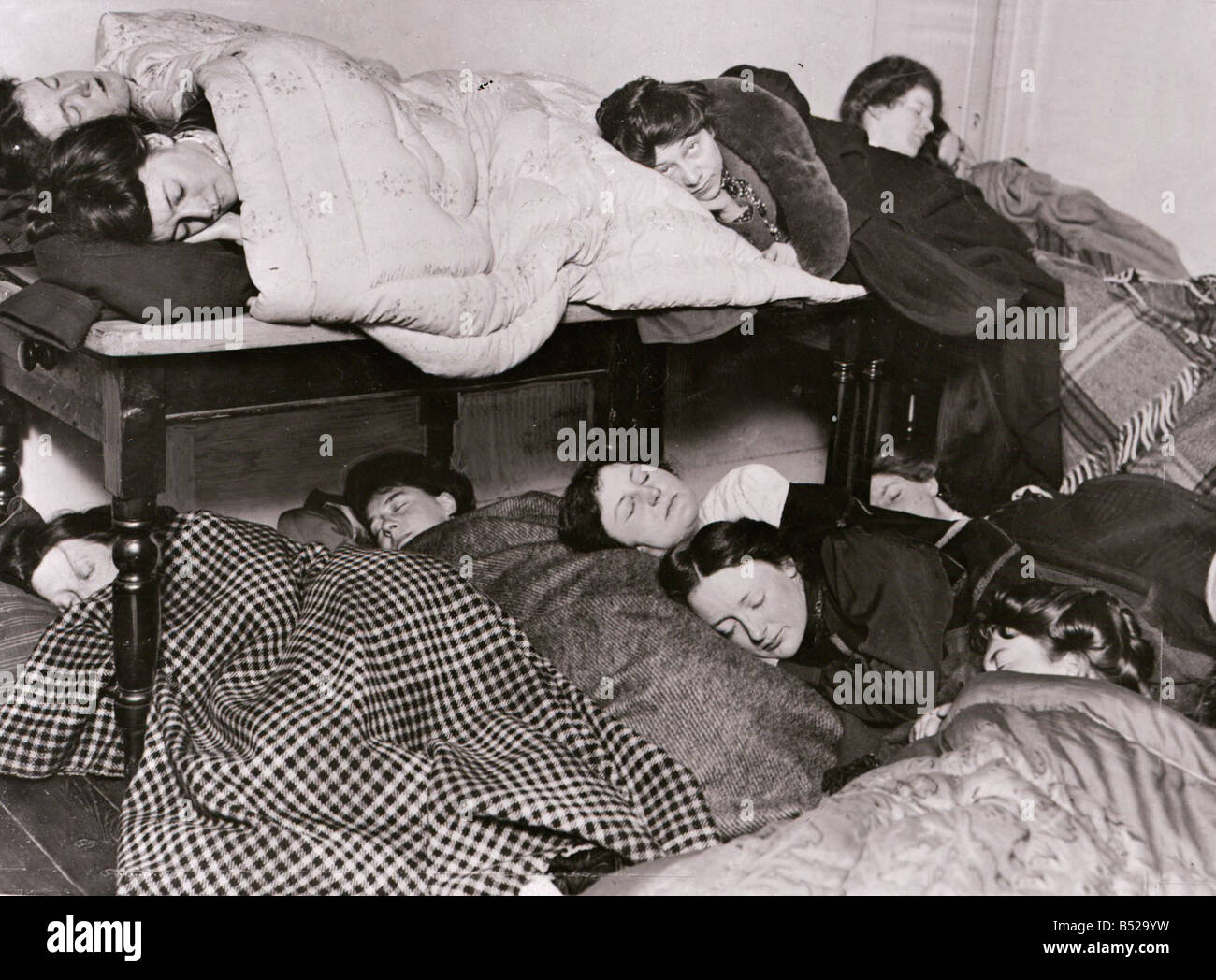 Suffragettes April 1911 Pictured sleeping at home of a friend who will refuse to fill up her schedule for the National Census Afterwards they have arranged to attend a midnight meeting in Trafalgar Square London Suffragettes 1910s Womens Rights Movement Stock Photo