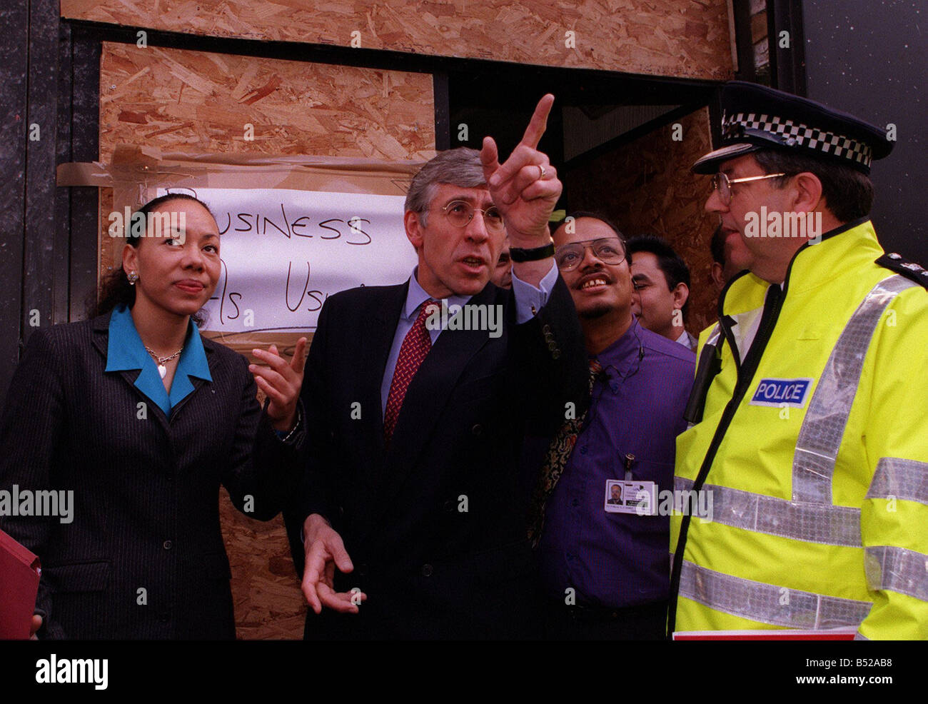 Jack Straw Home Secretary April 1999 surveys area of damage caused by Brick Lane Nail Bomb Explosion with Oona King MP bomb in her constituency also present Chief Super Walter Poulter Stock Photo