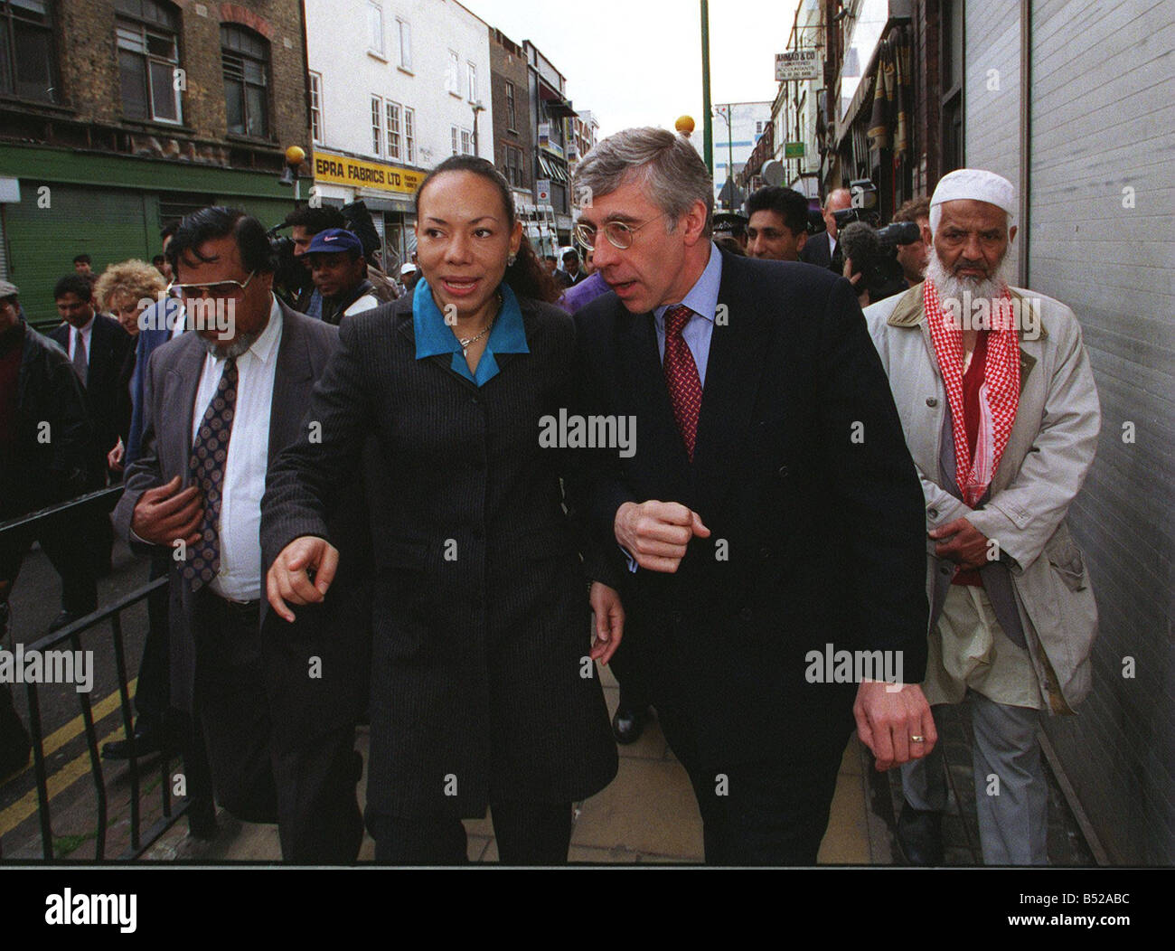 Jack Straw Home Secretary April 1999 surveys area of damage caused by Brick Lane Nail Bomb Explosion with Oona King MP bomb in her constituency Stock Photo