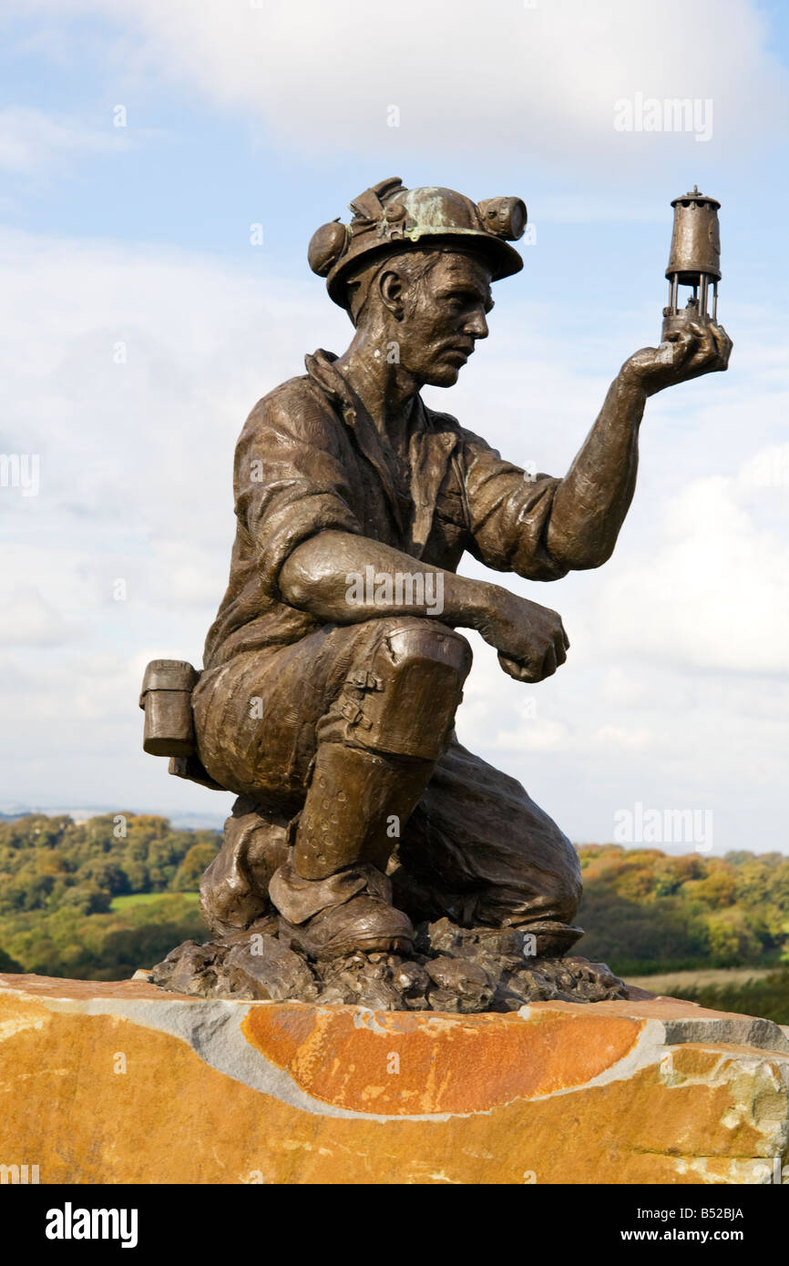 Miner with safety lamp sculpture, Silverhill colliery, Teversal, Nottinghamshire, England. Stock Photo