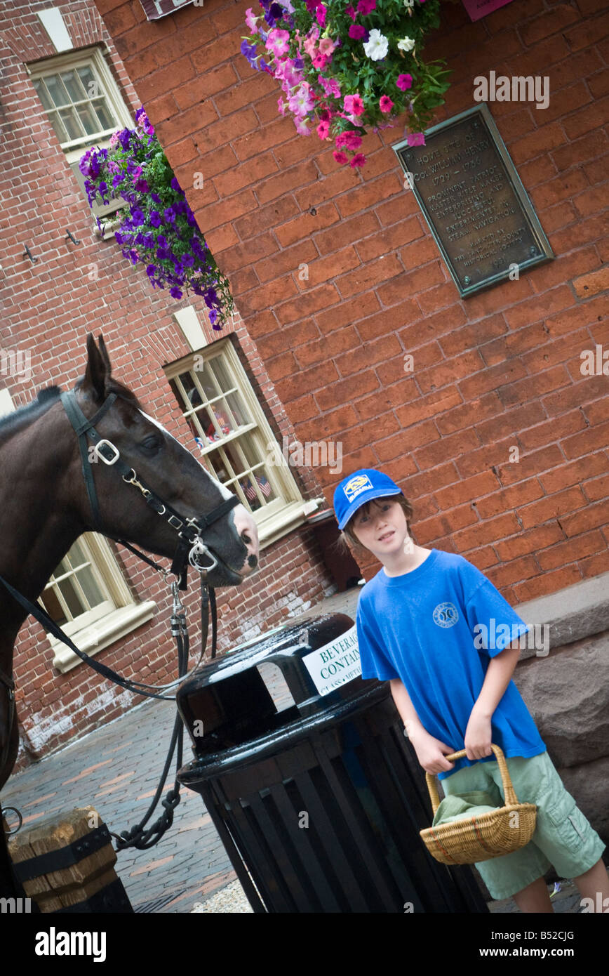 Young girl 9 10 11 12 with market basket. Outside Lancaster PA Farmers