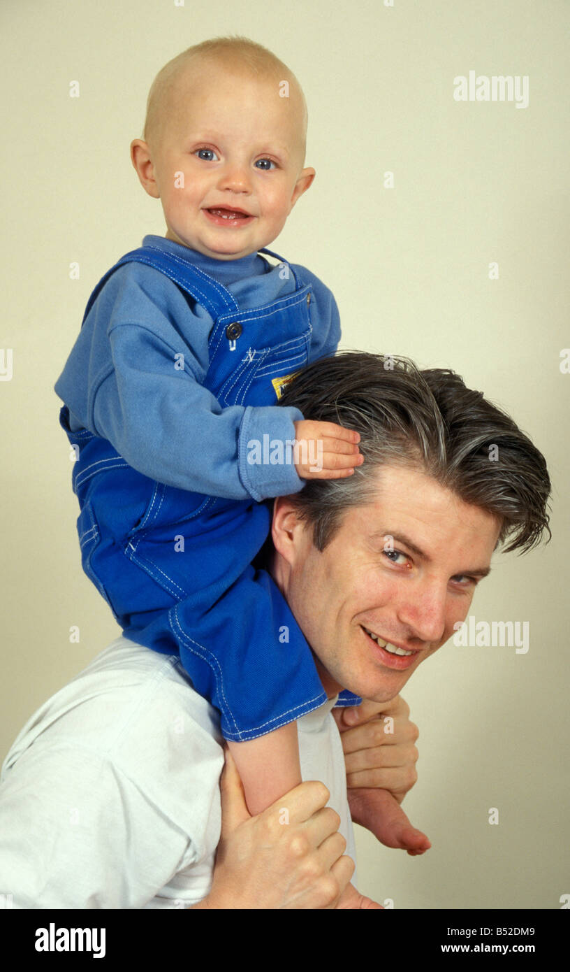 dad carrying baby