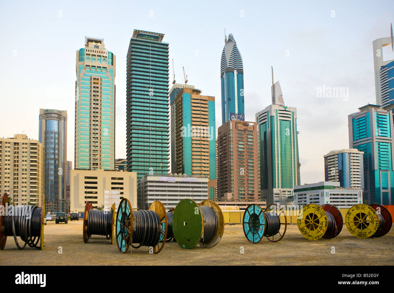 Cable Reels and skyline. United Arab Emirates Dubai Sheikh Zayed Road Stock Photo