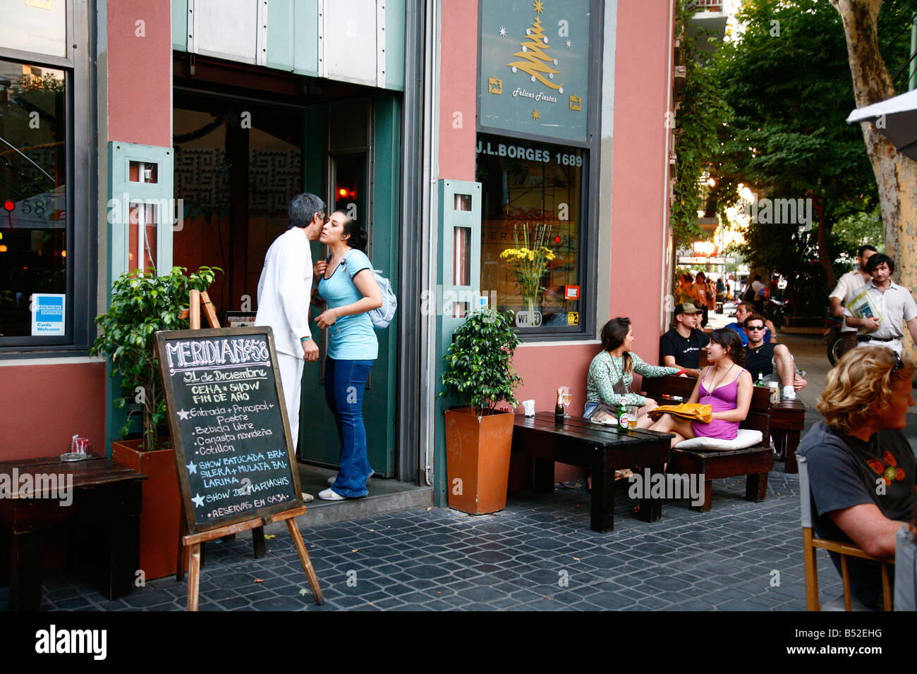 People sitting outside the Meridian 58 restaurant in the trendy area of Palermo Viejo known as Soho Buenos Aires Argentina Stock Photo