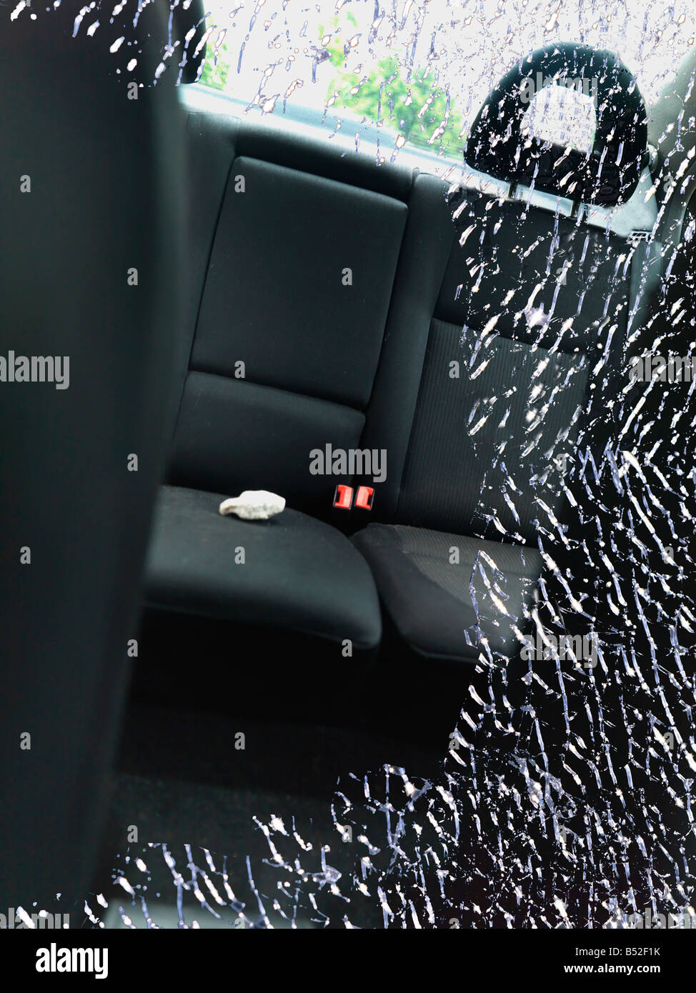 Smashed Glass Car and Stone Stock Photo Alamy