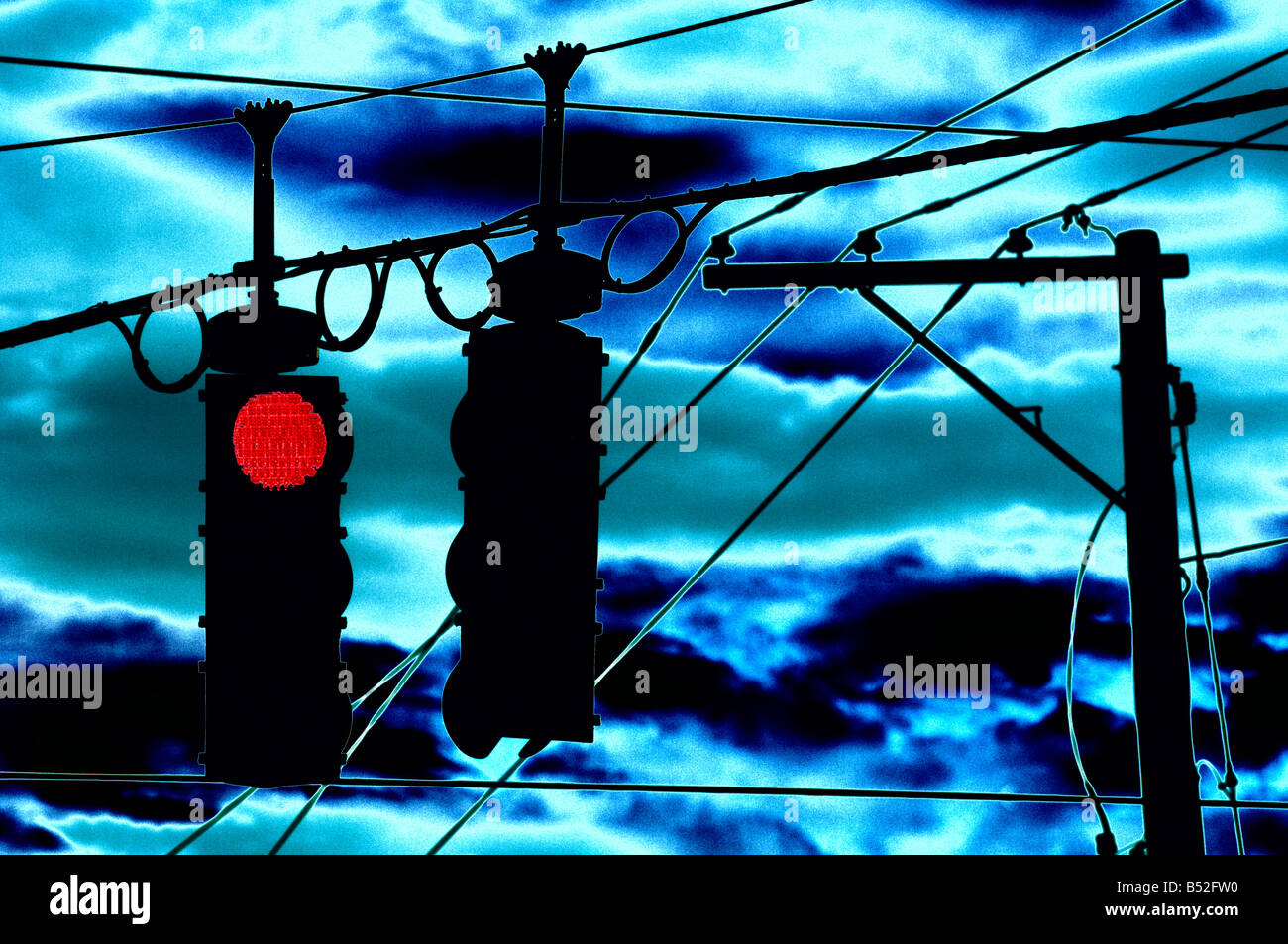digitally altered red traffic stop lights at night Stock Photo