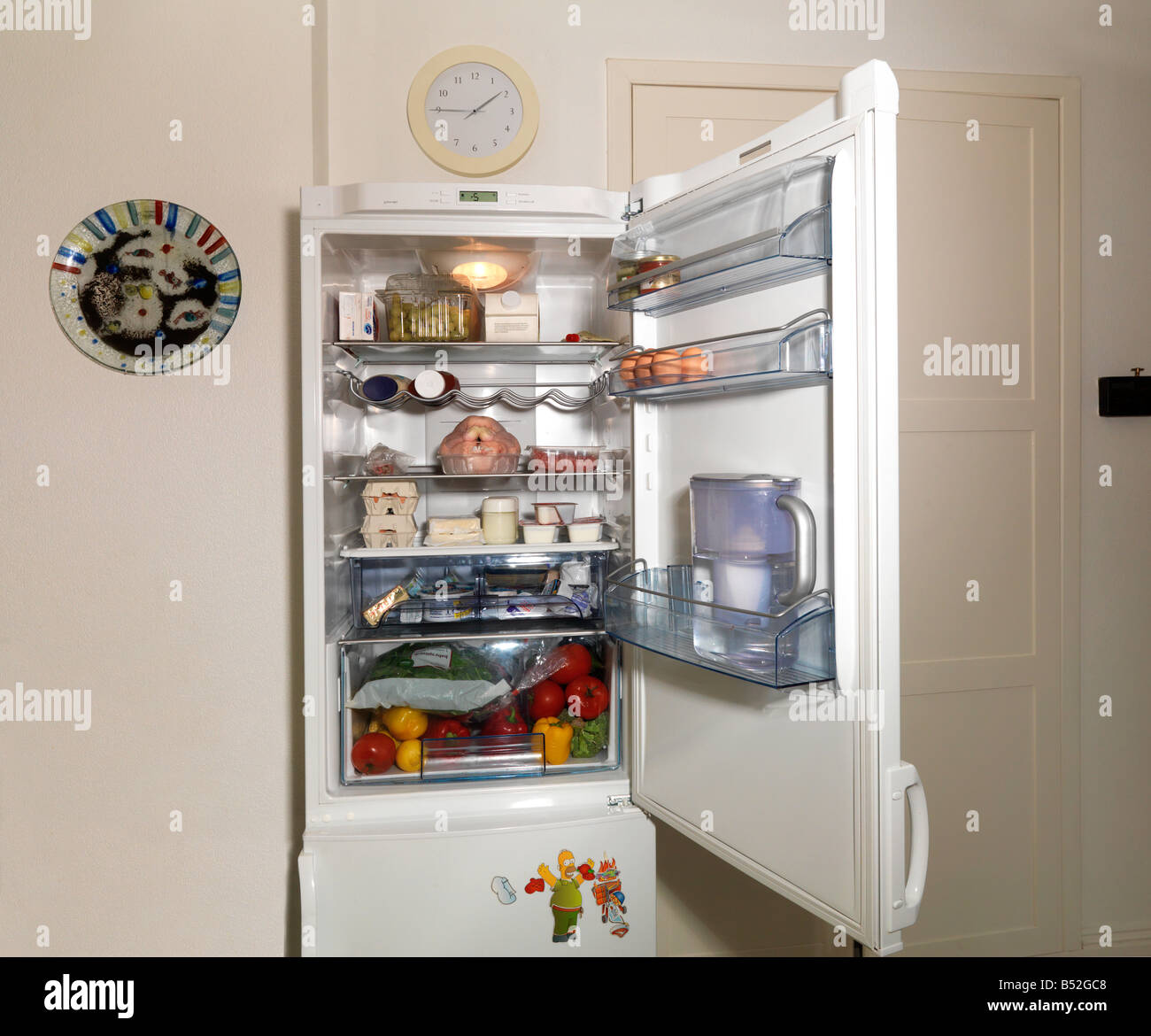 Interior of Fridge Showing Separate compartments for Produce Dairy and Meat Stock Photo
