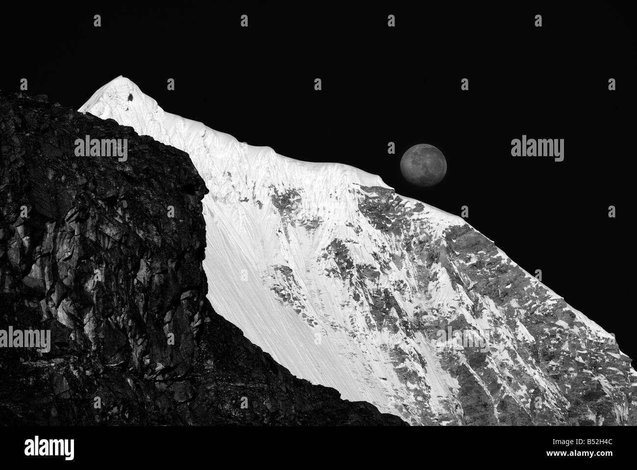 Moonset and Huandoy Sur 6,160m Stock Photo