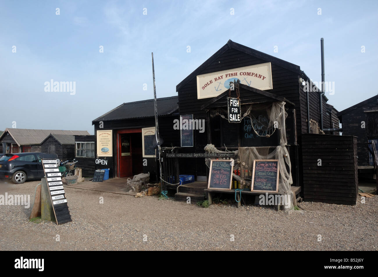 Rustic Fish Market Rustic fish shop by the harbour in Southwold, Suffolk, UK Stock Photo ...