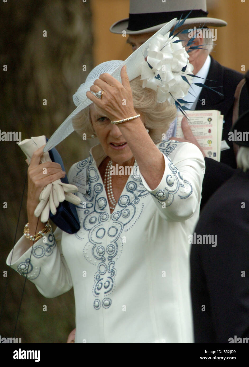 Camilla Duchess Of Cornwall Holds Her Hat As She Walks On A Windy Day At Royal Ascot Races 19th June 07 13 10 13 10 Stock Photo Alamy