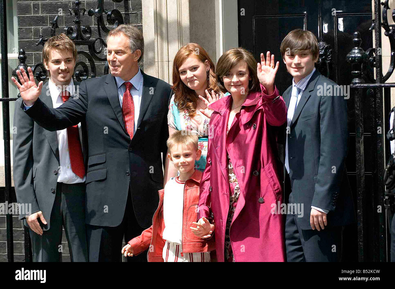 Tony Blair with his wife and children, leave Downing Street for the