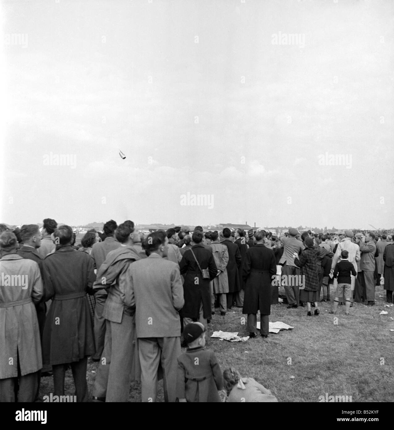 Thousands of spectators watched as a De Havilland 110 aircraft broke the sound barrier and then disintegrated in the sky above them and fell to earth.;Thirty-one people, including pilot John Derry, were killed. Dozens more were wounded at the Farnborough Air Show in Hampshire on 6 September 1952.;John Derry became the first British pilot to break the sound barrier, during a record attempt exactly four years before the accident. September 1952 C4399 Stock Photo